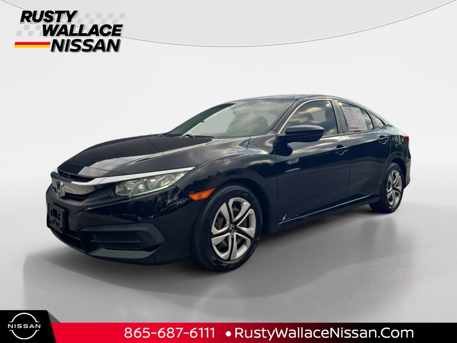 2018 Honda Civic LX in Crystal Black Pearl — front three-quarter view