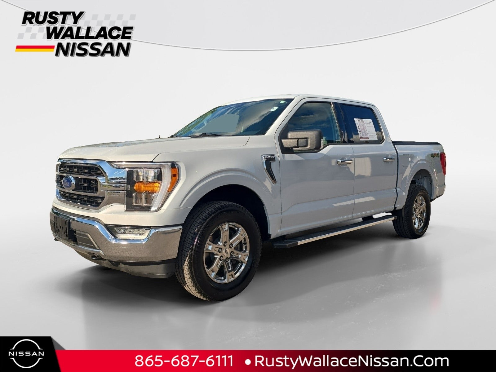 2022 Ford F-150 XLT in Space White Metallic — front three-quarter view