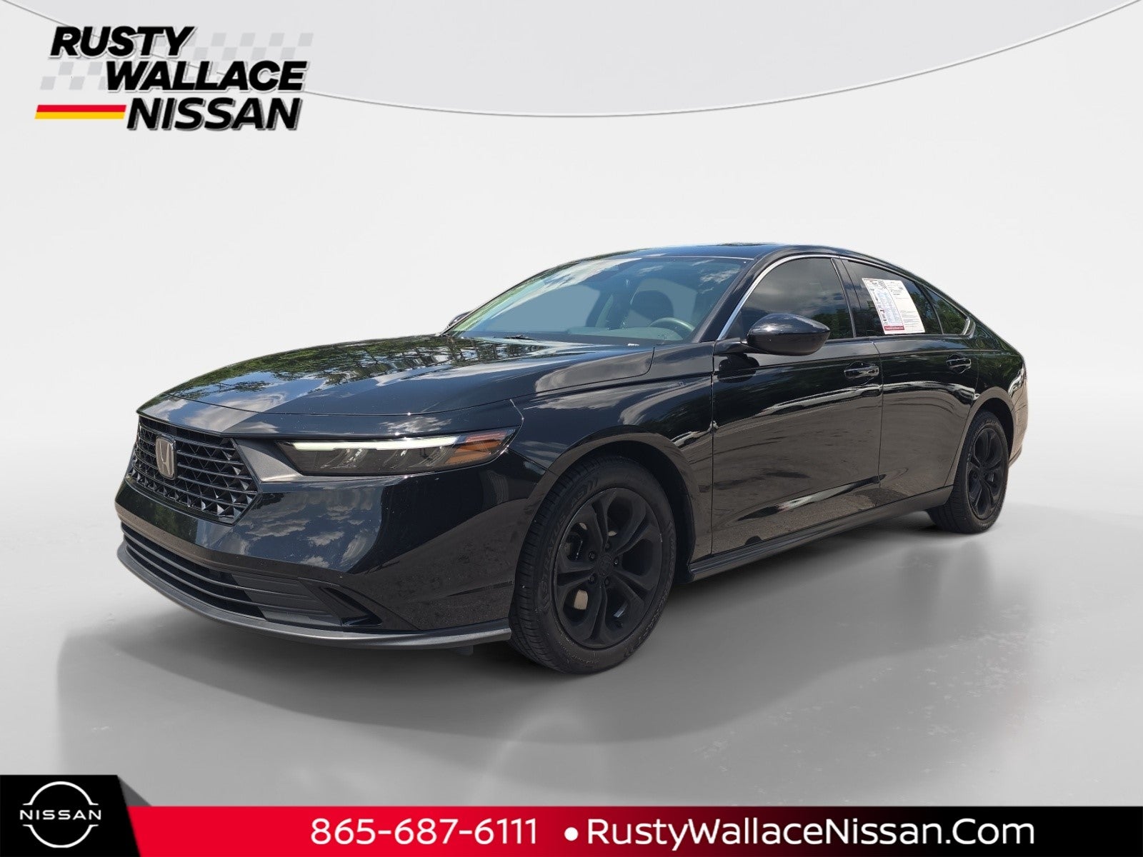 2023 Honda Accord EX in Crystal Black Pearl — front three-quarter view