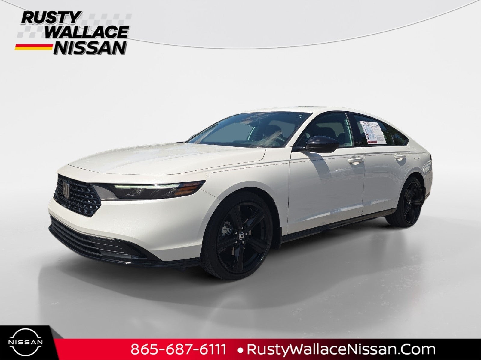 2025 Honda Accord Hybrid Sport-L in White — front three-quarter view