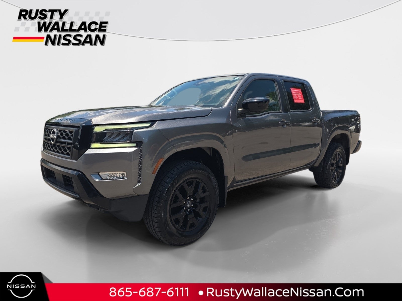 2023 Nissan Frontier SV in Gun Metallic — front three-quarter view
