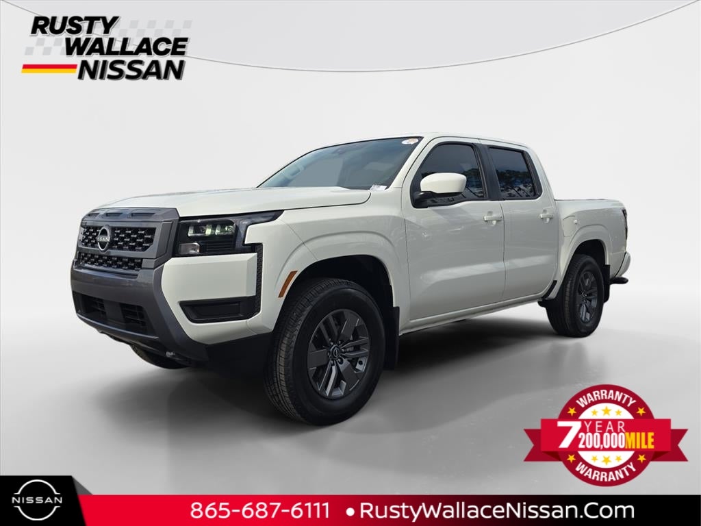2026 Nissan Frontier SV in Glacier White — front three-quarter view