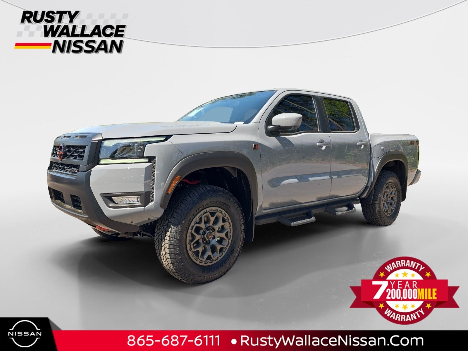 2026 Nissan Frontier PRO-4X w/R Package in Boulder Gray Pearl — front three-quarter view
