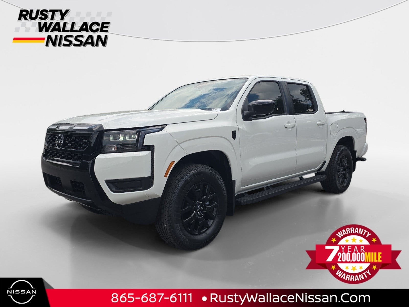 2026 Nissan Frontier SV in Glacier White — front three-quarter view