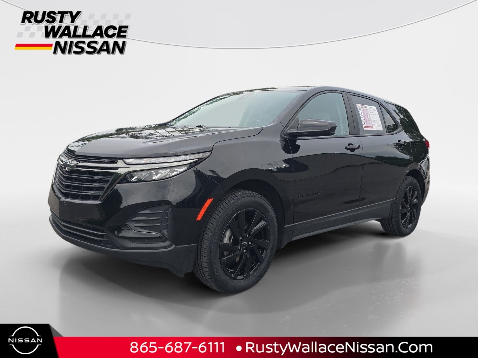2023 Chevrolet Equinox LS in Mosaic Black Metallic — front three-quarter view