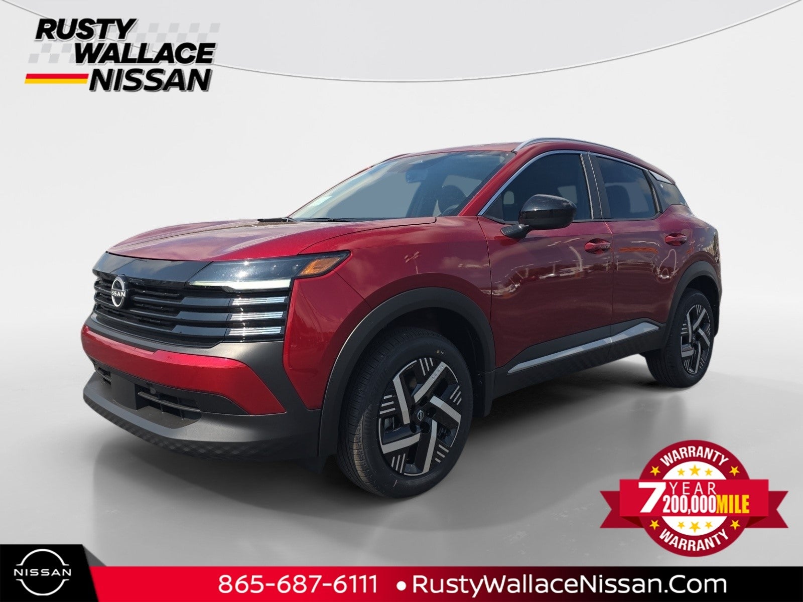 2026 Nissan Kicks SV in Scarlet Em — front three-quarter view