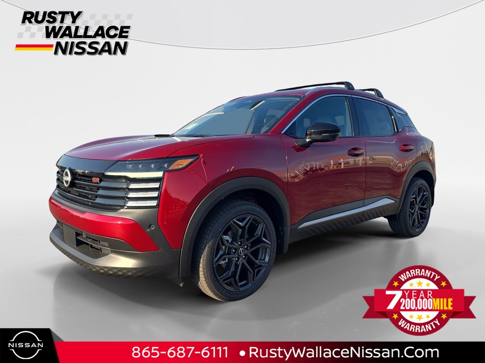 2026 Nissan Kicks SR in Scarlet Em — front three-quarter view