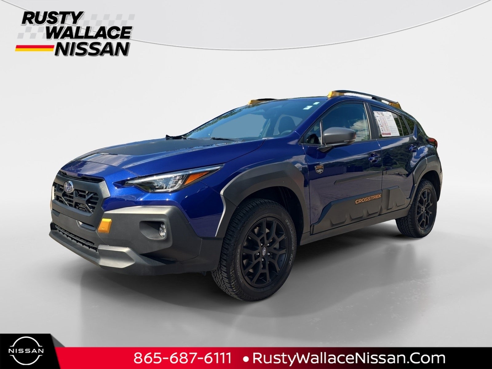 2024 Subaru Crosstrek Wilderness in Sapphire Blue Pearl — front three-quarter view