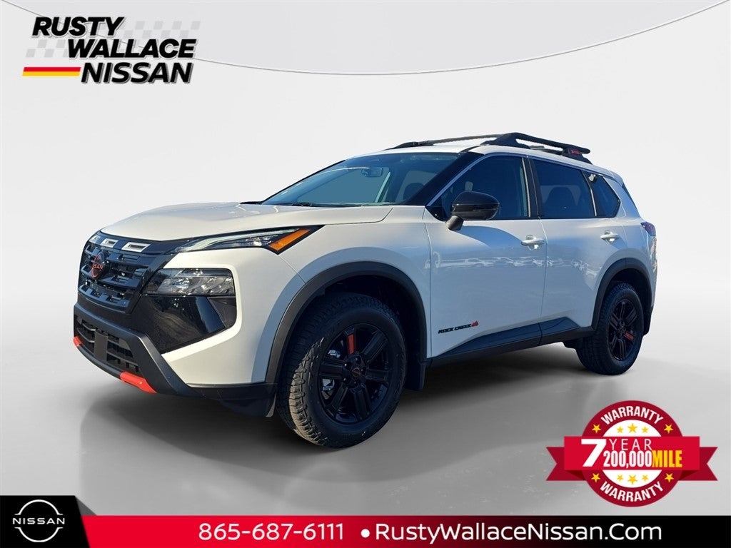 2026 Nissan Rogue Rock Creek in Everest White Pearl Tricoat — front three-quarter view