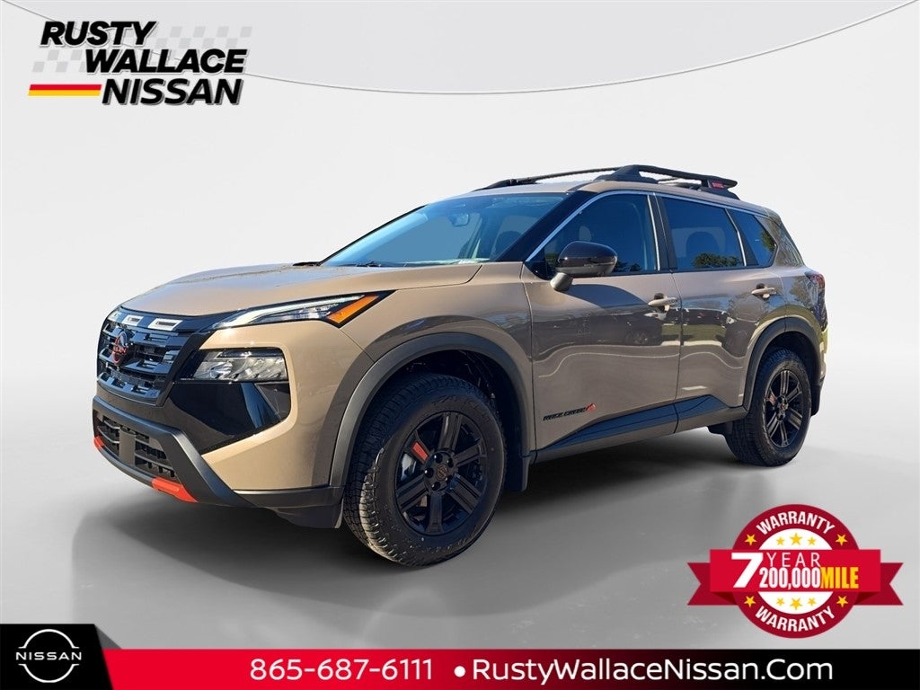 2026 Nissan Rogue Rock Creek in Baja Storm Metallic — front three-quarter view