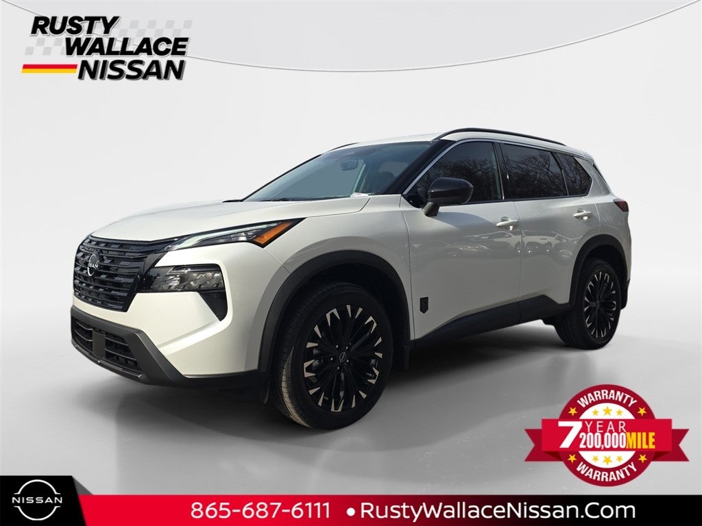 2026 Nissan Rogue Dark Armor in Everest White Pearl Tricoat — front three-quarter view