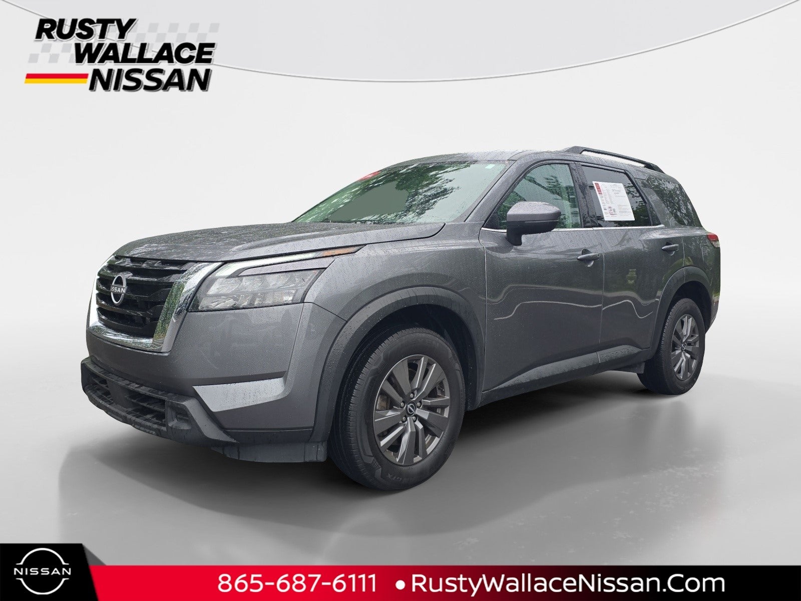 2025 Nissan Pathfinder SV in Gun Metallic — front three-quarter view