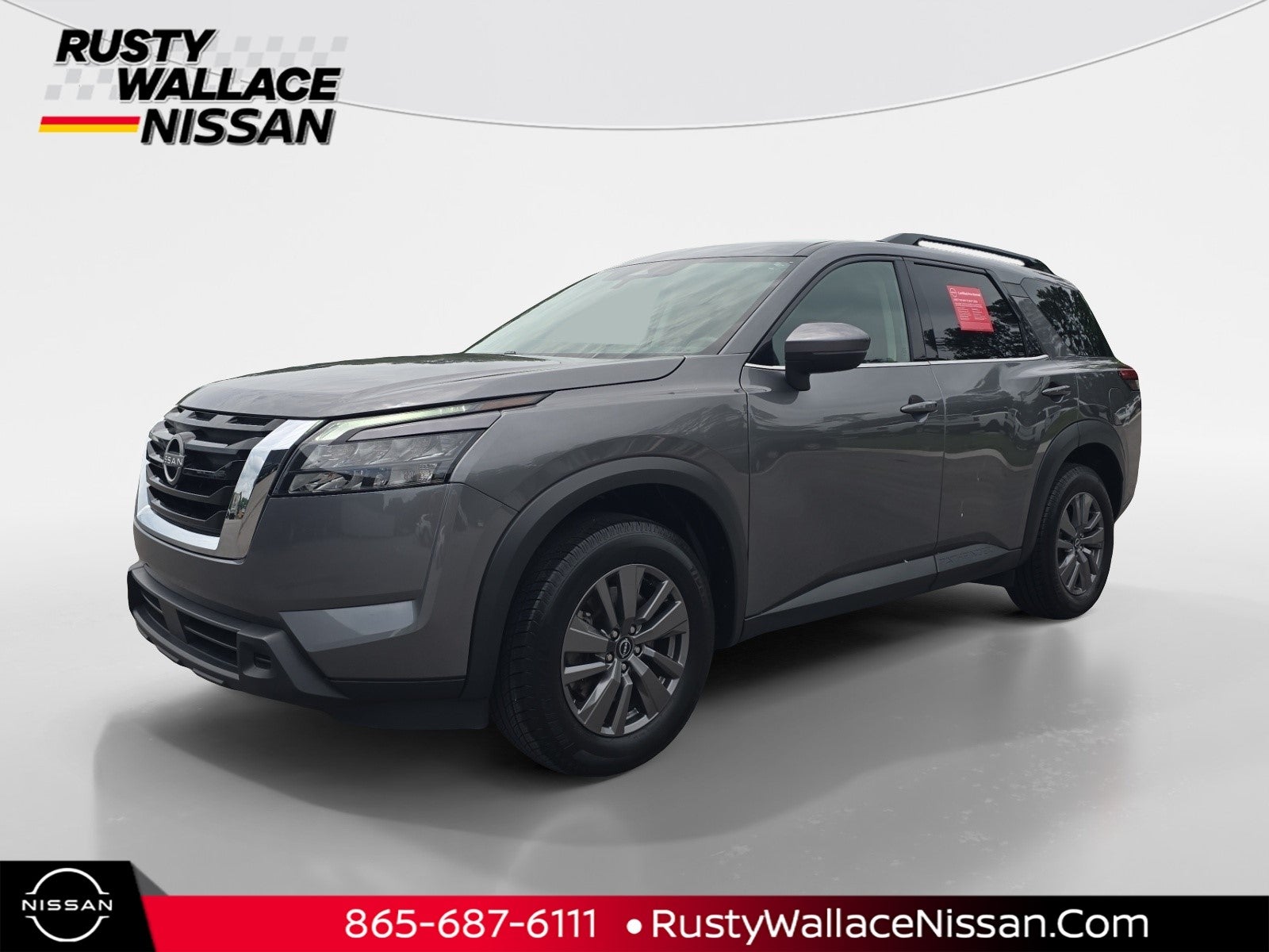 2024 Nissan Pathfinder SV in Gun Metallic — front three-quarter view