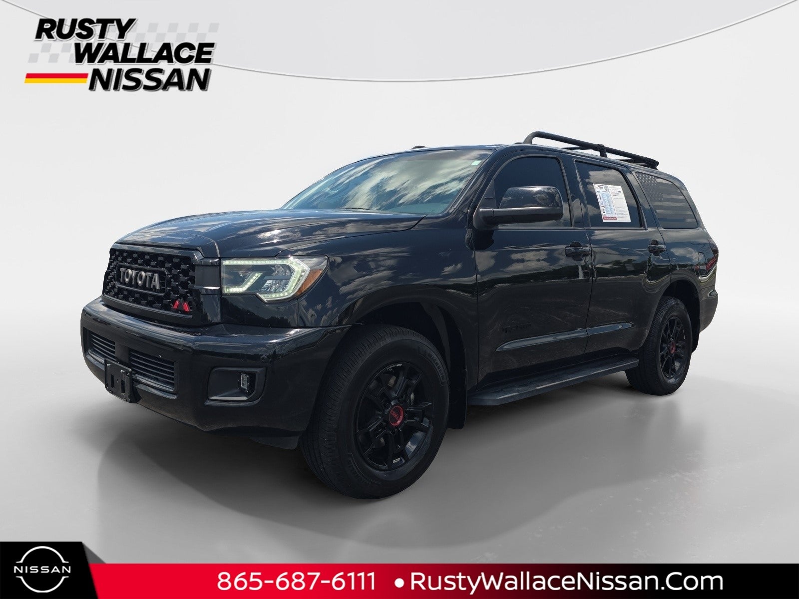 2020 Toyota Sequoia TRD Pro in Midnight Black Metallic — front three-quarter view
