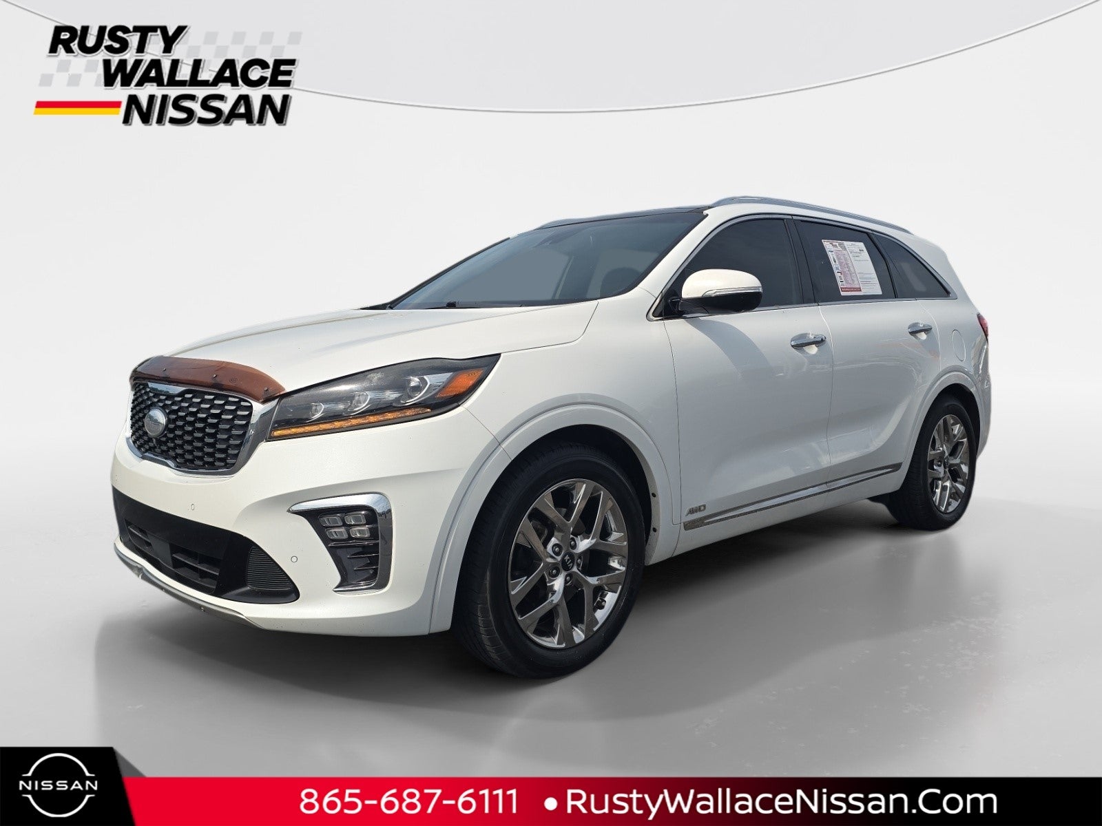 2019 Kia Sorento SX Limited V6 in Snow White Pearl — front three-quarter view