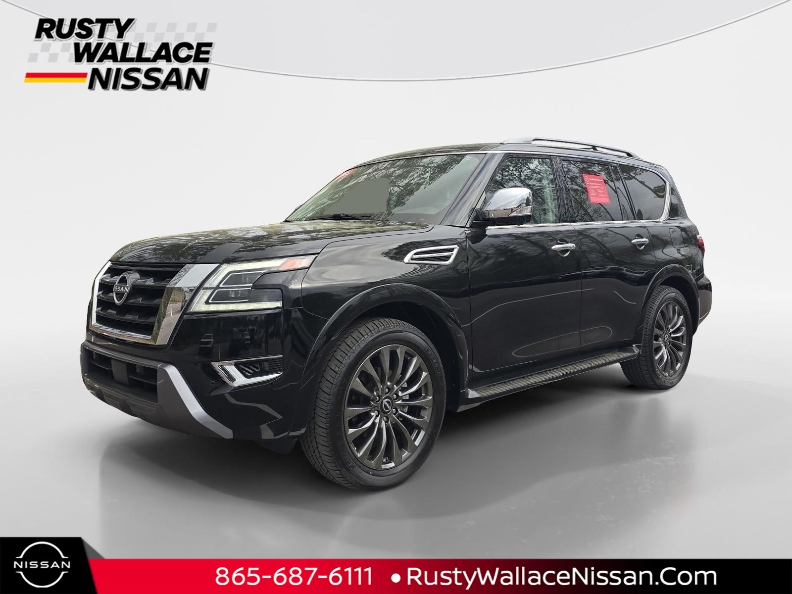 2024 Nissan Armada Platinum in Super Black — front three-quarter view