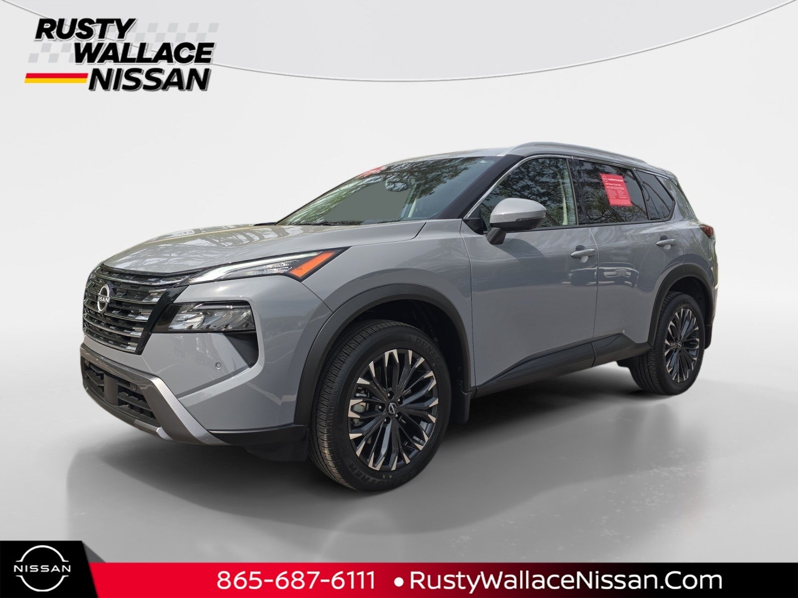 2025 Nissan Rogue SL in Boulder Gray Pearl — front three-quarter view
