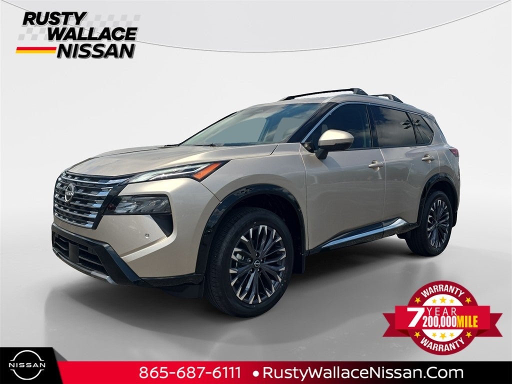 2026 Nissan Rogue Platinum in Champagne — front three-quarter view