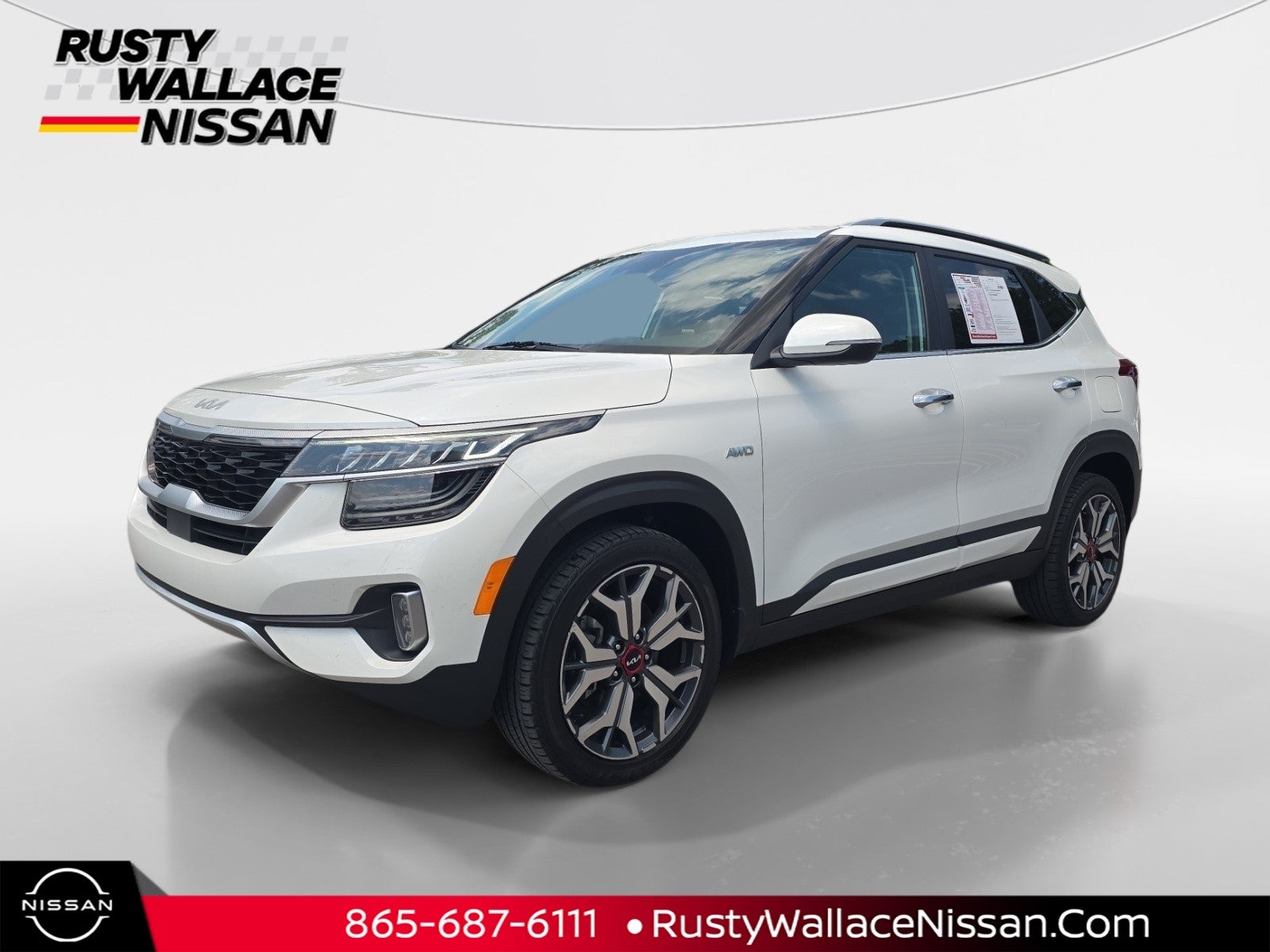 2022 Kia Seltos SX in Snow White Pearl — front three-quarter view