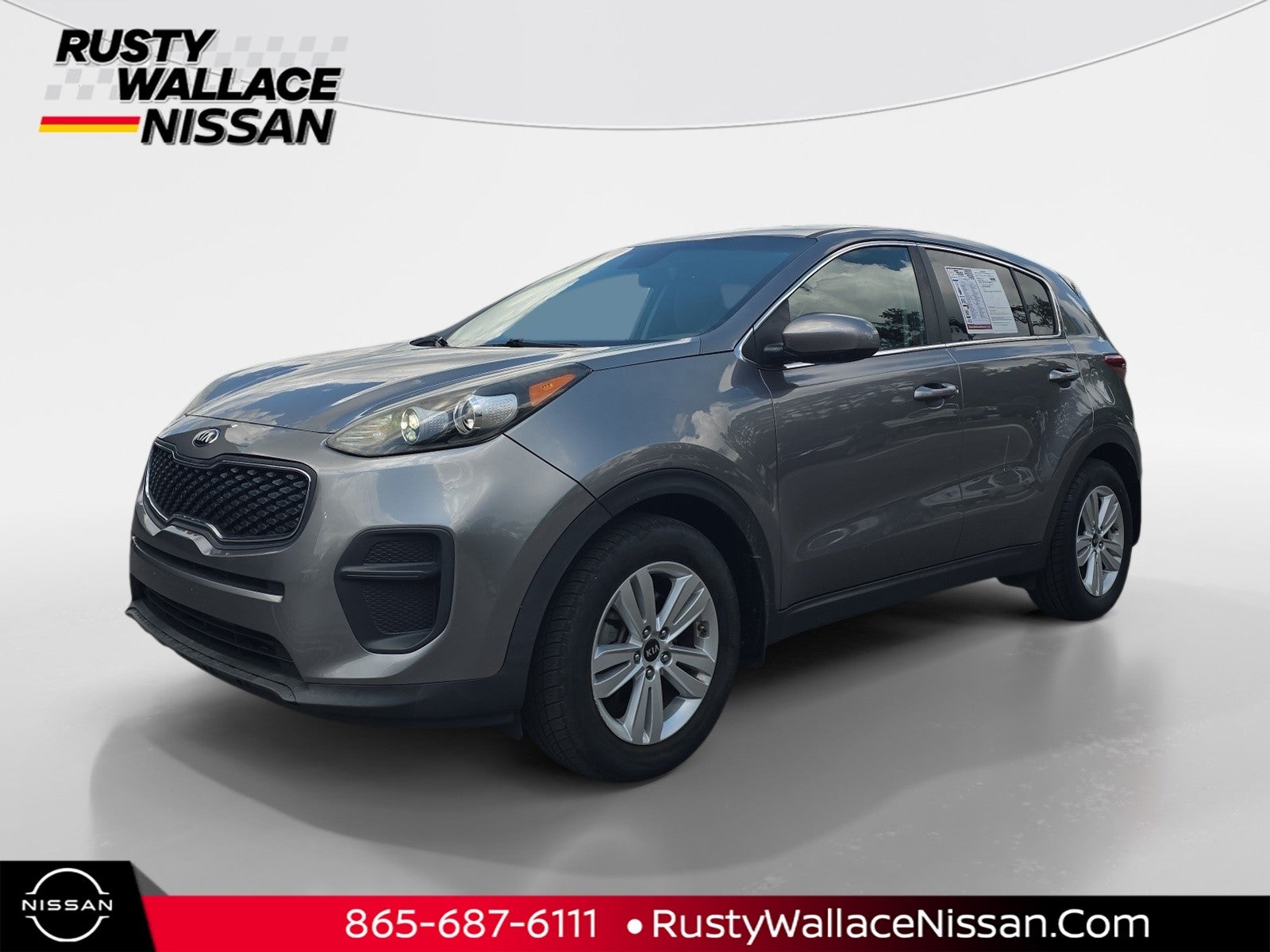 2017 Kia Sportage LX in Mineral Silver — front three-quarter view