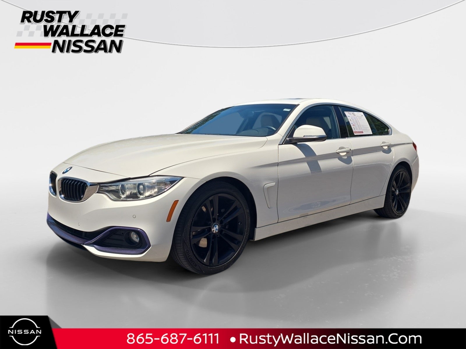 2016 BMW 4 series 428i in Alpine White — front three-quarter view